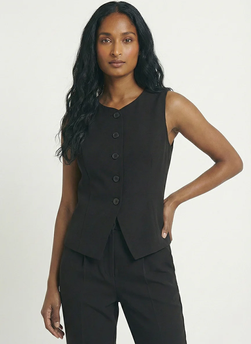 La veste sans manches boutonnée ouverte au bas - Image 6