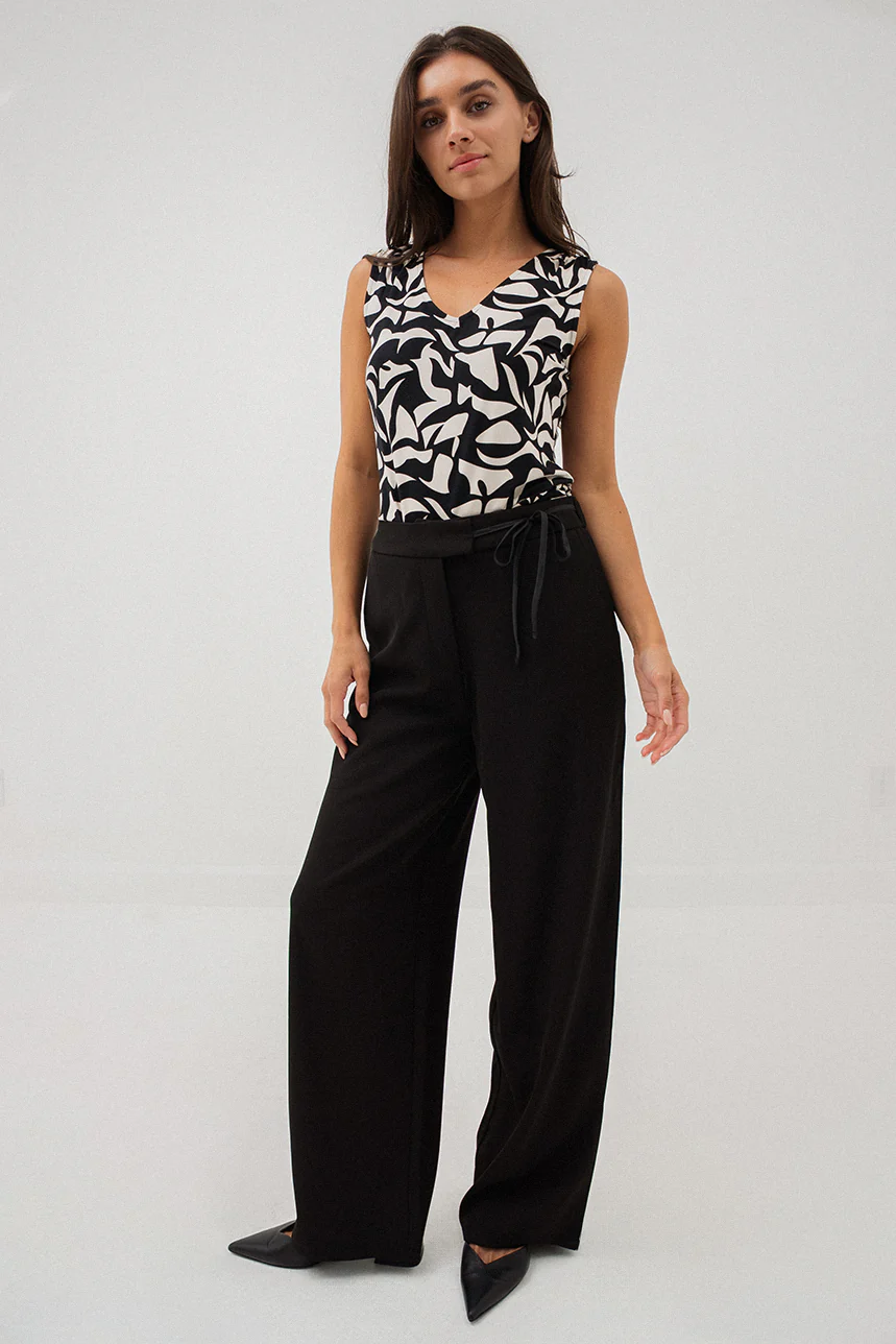 Le pantalon chic noir avec boucle à la ceinture - Image 5