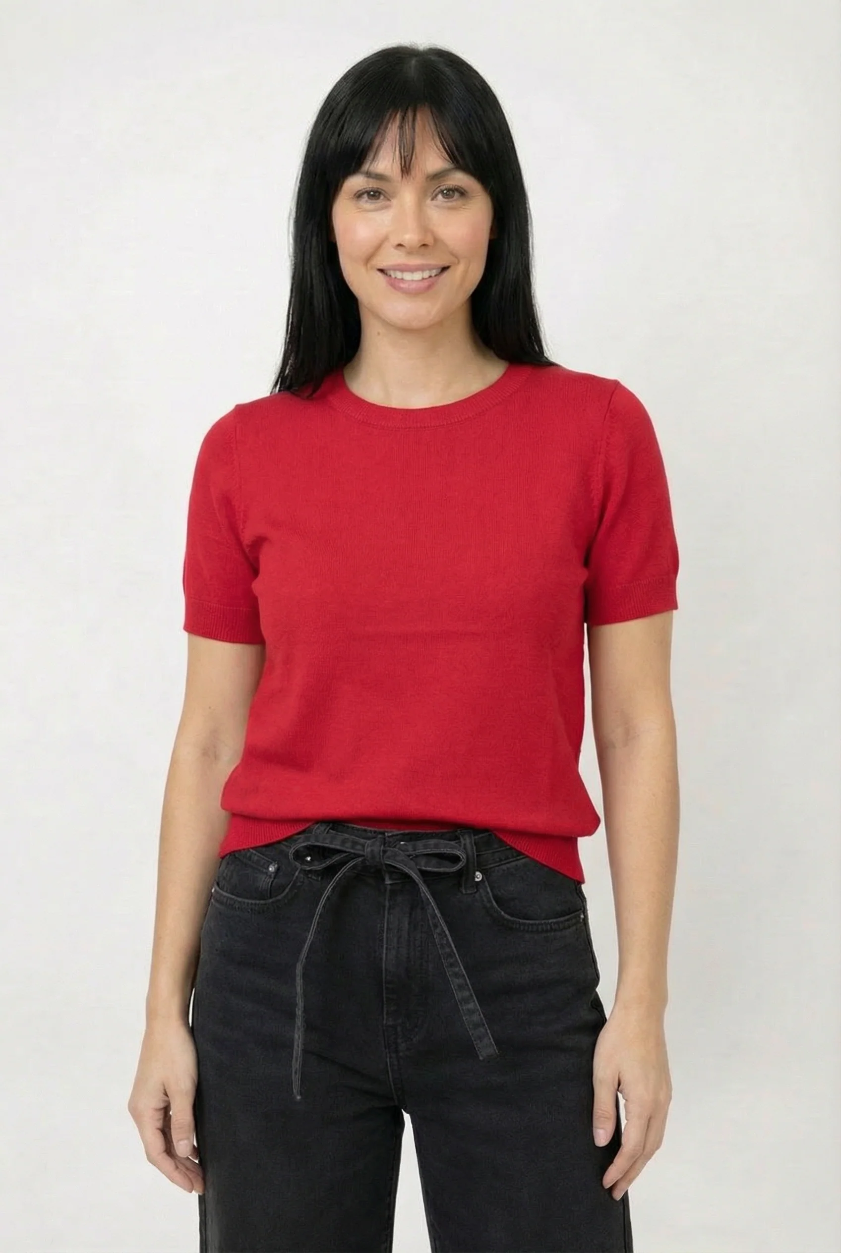 Le chandail en tricot à manches courtes doux et confortable