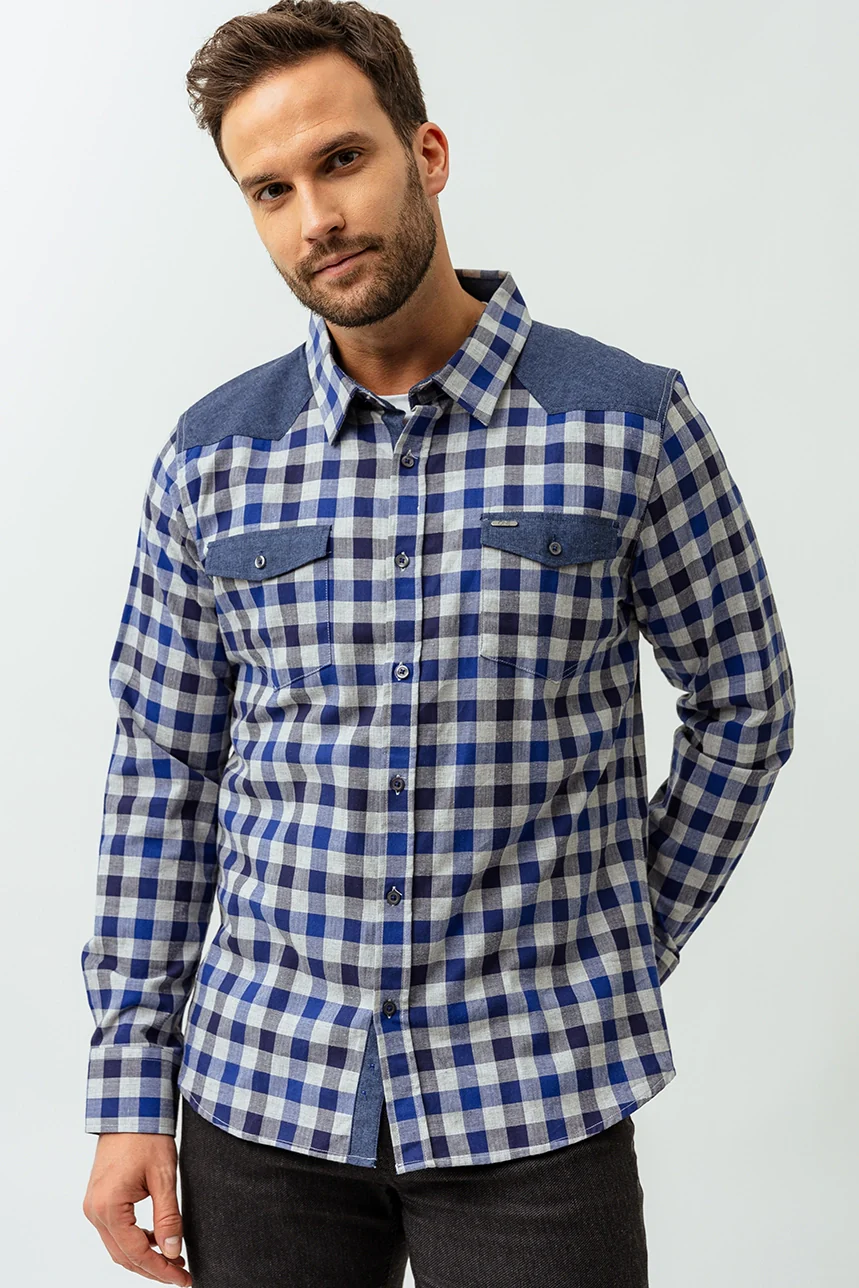 La chemise à carreaux revers contrastes