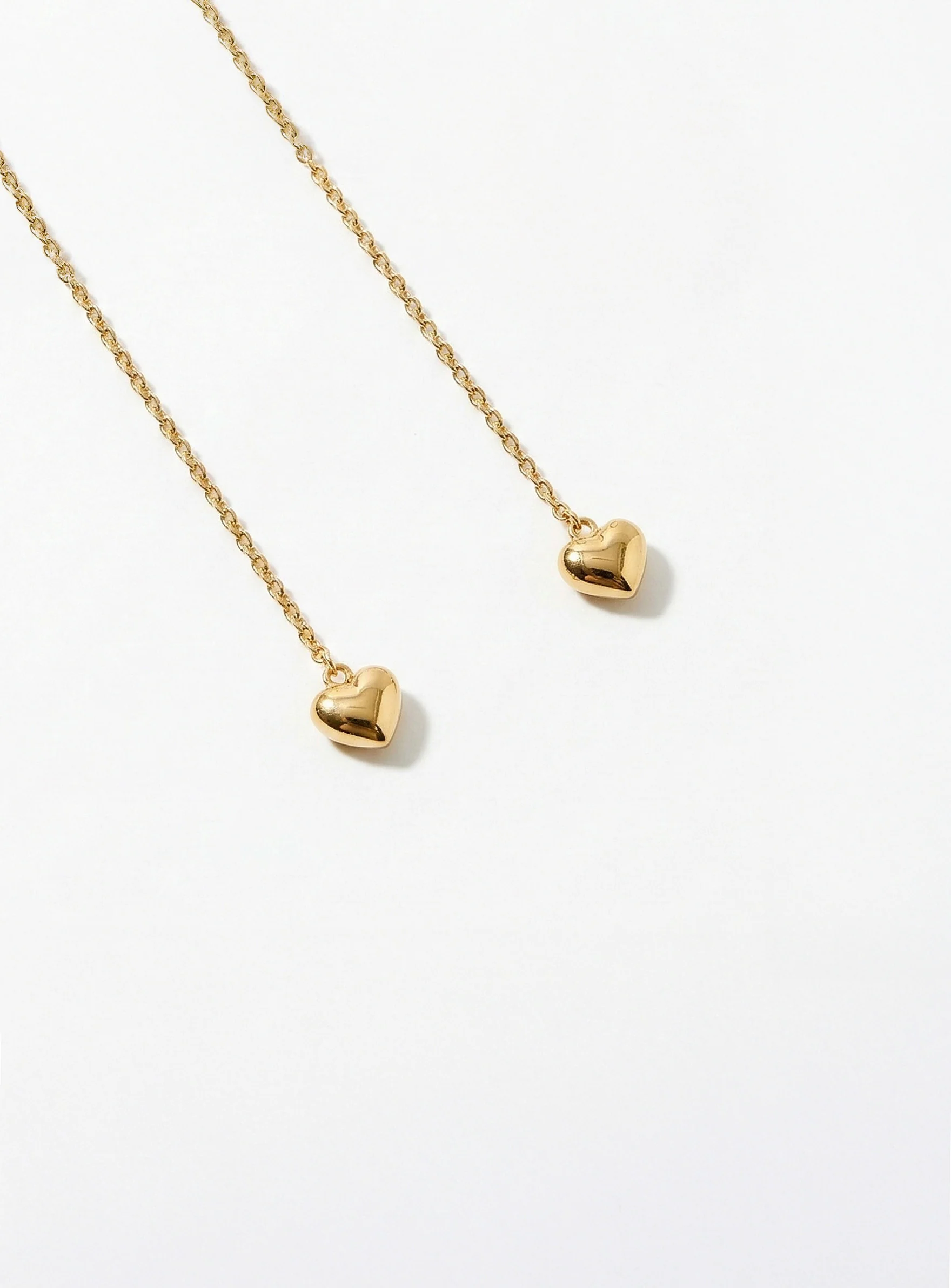Boucles d’oreilles pendantes cœur or