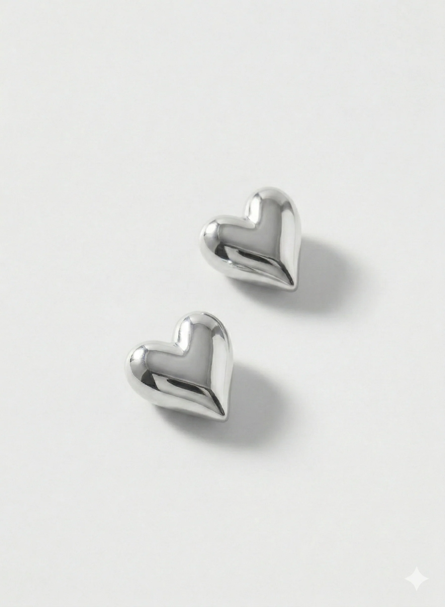 Boucles d’oreilles cœur bombé argent
