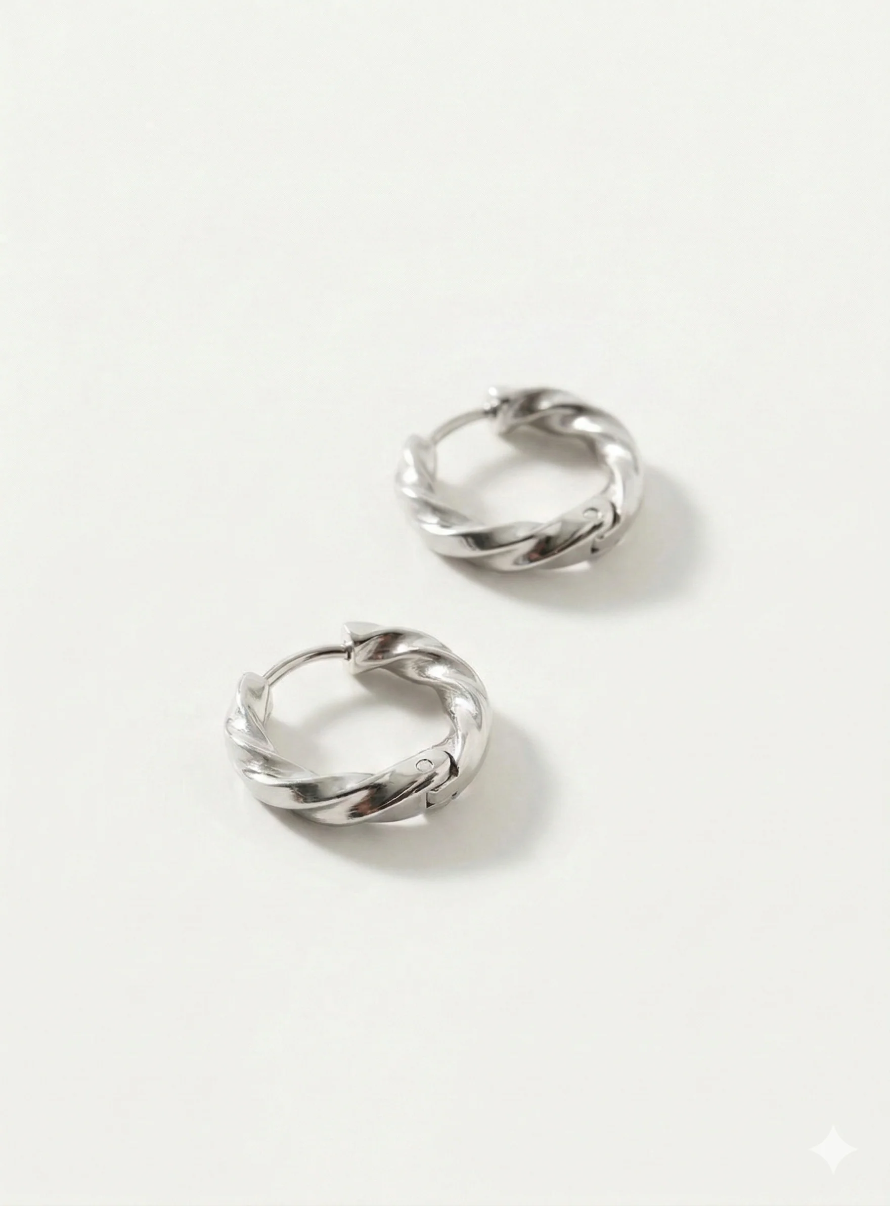 Boucles d’oreilles anneaux torsadés argent